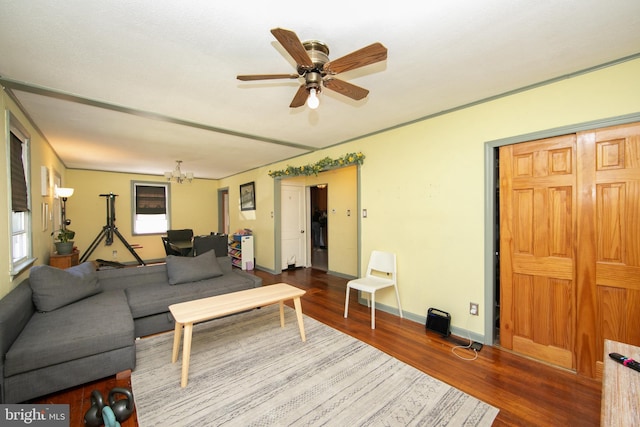 43 Churchill Rd, Cherry Hill, NJ 08034 - living area with baseboards, ceiling fan with notable chandelier, and wood finished floors