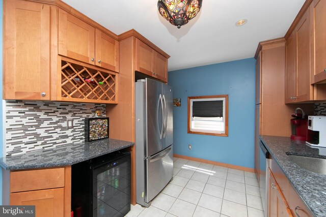 43 Churchill Rd, Cherry Hill, NJ 08034 - kitchen featuring tasteful backsplash, light tile patterned floors, baseboards, beverage cooler, and stainless steel appliances