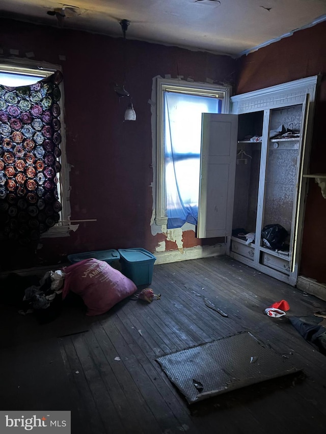 unfurnished bedroom featuring hardwood / wood-style flooring