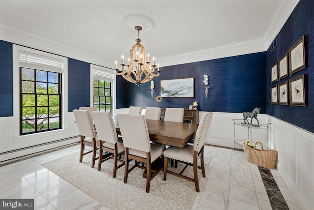 dining room featuring crown molding, a notable chandelier, wainscoting, and a baseboard radiator