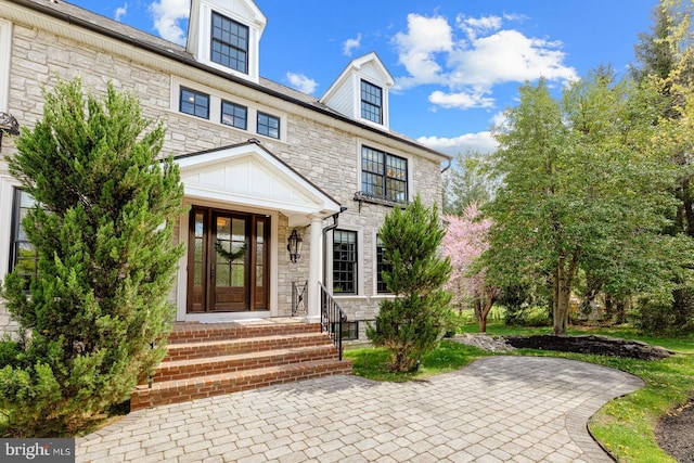view of front of house featuring stone siding