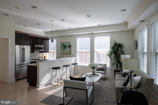 1421 Florida Ave NW Unit 5, Washington, DC 20009 - living area with light wood-style floors, baseboards, recessed lighting, and visible vents