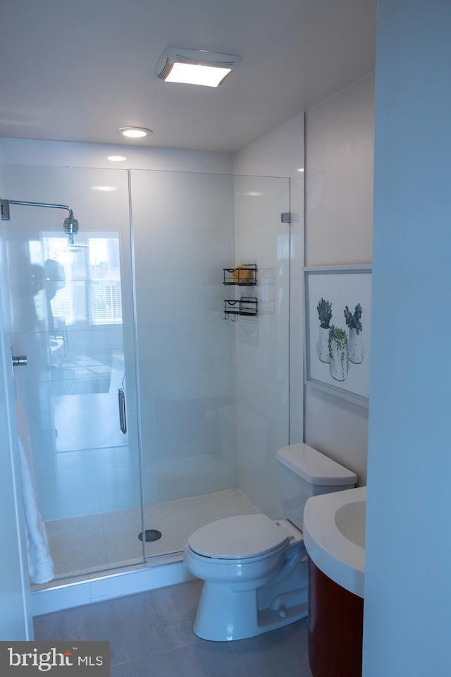 1421 Florida Ave NW Unit 5, Washington, DC 20009 - full bath with a stall shower, tile patterned flooring, toilet, and vanity