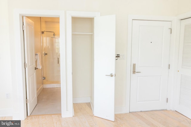 1421 Florida Ave NW Unit 5, Washington, DC 20009 - unfurnished bedroom with a closet, light wood finished floors, and connected bathroom