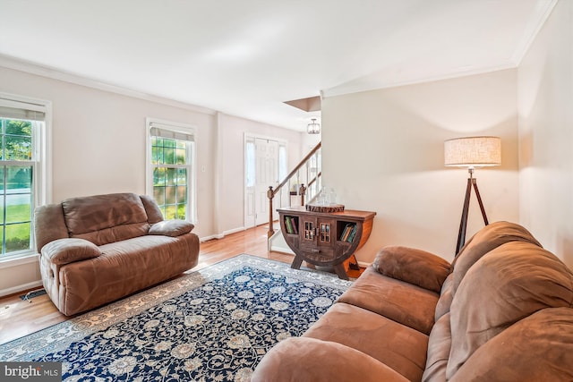 living area featuring a healthy amount of sunlight and wood finished floors