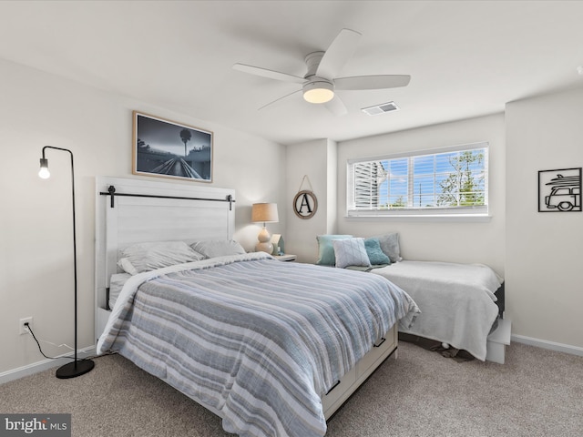 35040 Dundee St Unit 133, Frankford, DE 19945 - carpeted bedroom featuring ceiling fan, baseboards, and visible vents
