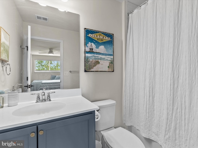 35040 Dundee St Unit 133, Frankford, DE 19945 - bathroom featuring a ceiling fan, toilet, ensuite bathroom, visible vents, and vanity