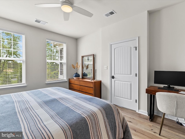 35040 Dundee St Unit 133, Frankford, DE 19945 - bedroom featuring visible vents, wood finished floors, baseboards, and ceiling fan