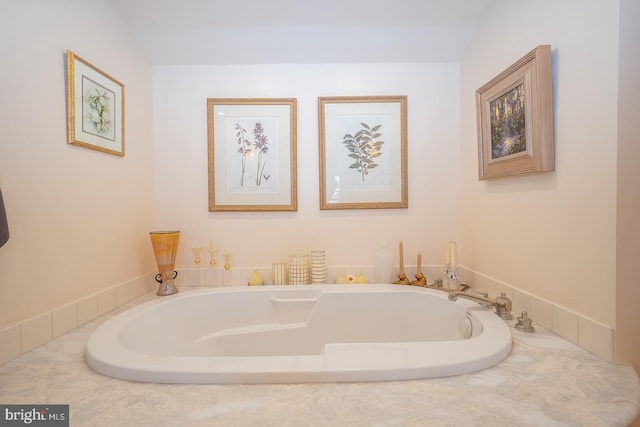 full bathroom featuring a bath