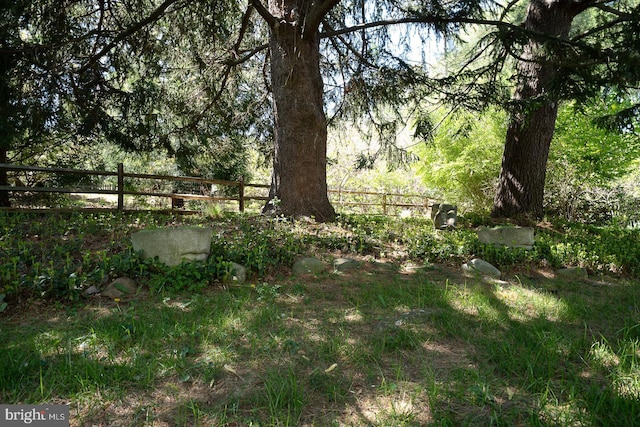 view of yard with fence