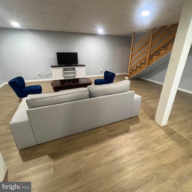 54 Ethel Ave, Hummelstown, PA 17036 - living area with baseboards, stairway, and wood finished floors