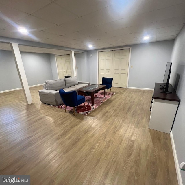 54 Ethel Ave, Hummelstown, PA 17036 - living area featuring wood finished floors, baseboards, and a drop ceiling