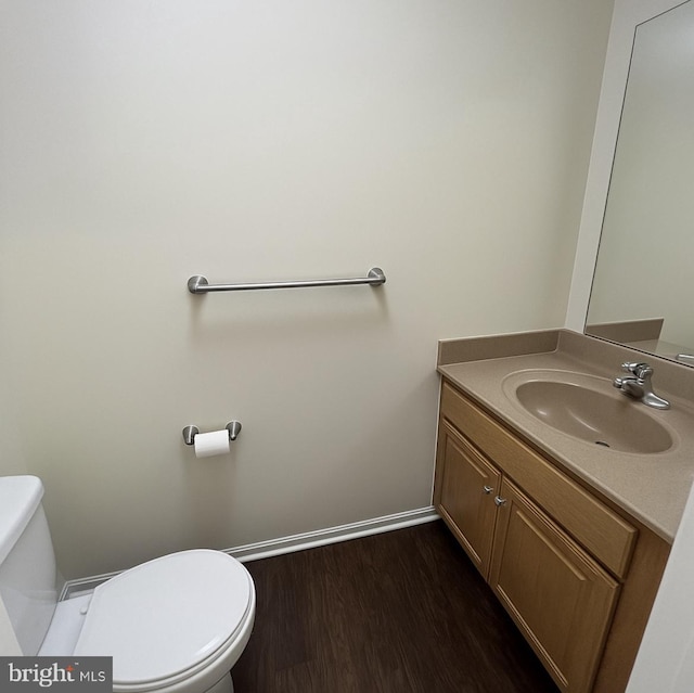 54 Ethel Ave, Hummelstown, PA 17036 - bathroom with toilet, wood finished floors, and vanity