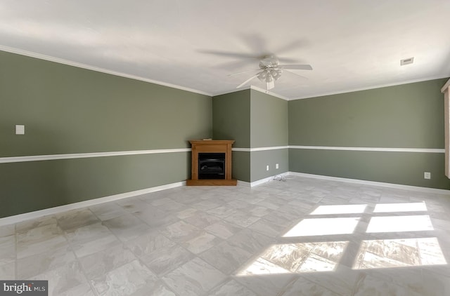 unfurnished living room featuring crown molding, baseboards, ceiling fan, and visible vents