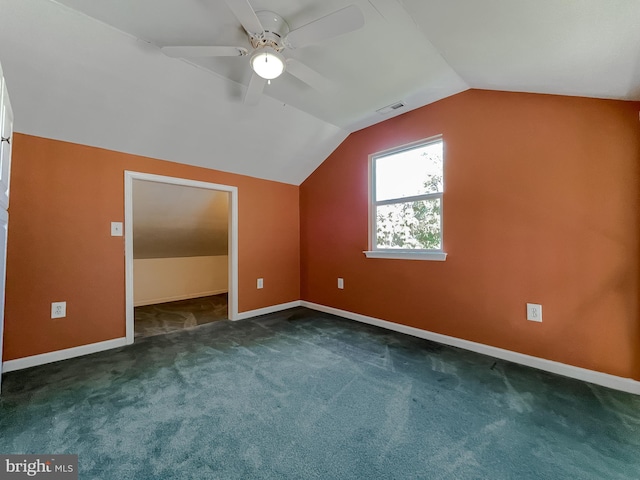 bonus room with ceiling fan, carpet floors, baseboards, lofted ceiling, and visible vents