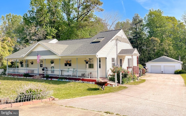view of front of house featuring a porch, an outdoor structure, roof with shingles, and a detached garage
