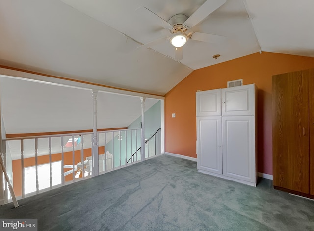 bonus room with ceiling fan, visible vents, carpet floors, baseboards, and vaulted ceiling