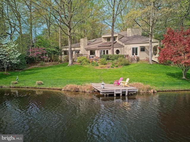 11566 Lake Newport Rd, Reston, VA 20194 - rear view of property with a water view, a yard, and a chimney