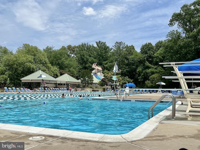 11566 Lake Newport Rd, Reston, VA 20194 - community pool featuring a gazebo, a patio area, and view of scattered trees