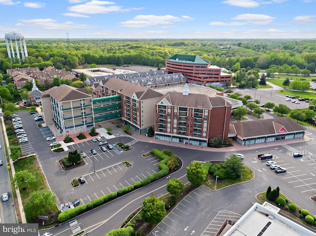 aerial view with a wooded view