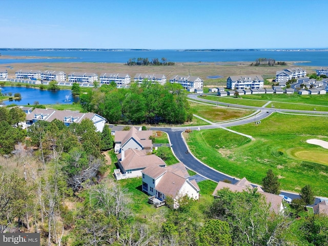 bird's eye view with a residential view and a water view