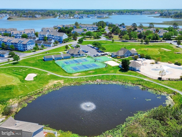 bird's eye view featuring a water view, a residential view, and golf course view