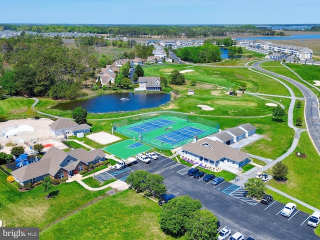 aerial view featuring a water view and view of golf course