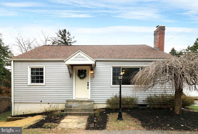 1724 E Branch Rd, State College, PA 16801 - view of front of house featuring entry steps, a shingled roof, and a chimney