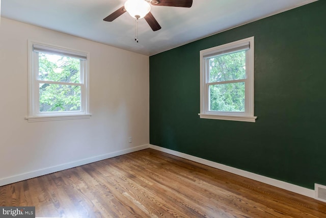 1724 E Branch Rd, State College, PA 16801 - spare room featuring healthy amount of natural light, baseboards, and wood finished floors