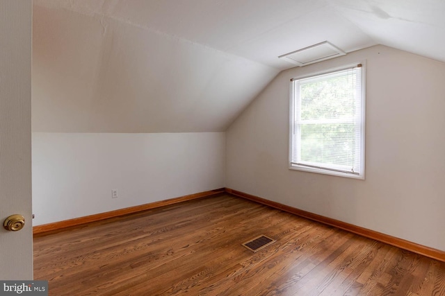 1724 E Branch Rd, State College, PA 16801 - bonus room with lofted ceiling, wood finished floors, baseboards, and attic access