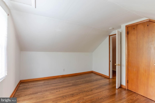 1724 E Branch Rd, State College, PA 16801 - additional living space with vaulted ceiling, light wood-type flooring, and baseboards