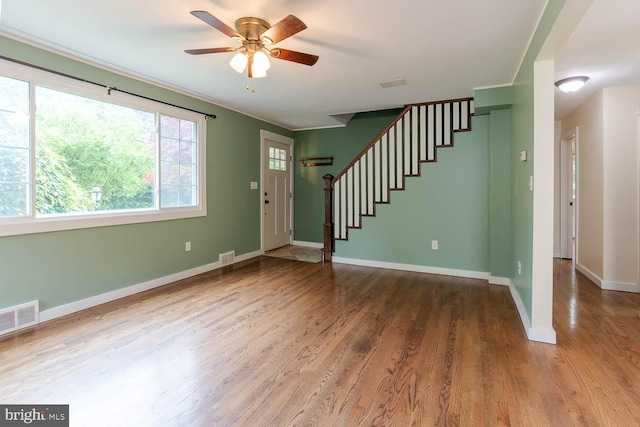 1724 E Branch Rd, State College, PA 16801 - entrance foyer featuring wood finished floors, stairs, a ceiling fan, baseboards, and crown molding