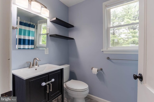 1724 E Branch Rd, State College, PA 16801 - full bath featuring toilet, vanity, baseboards, and a shower with shower curtain