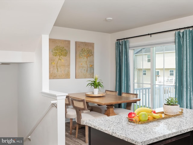 dining space with light wood finished floors