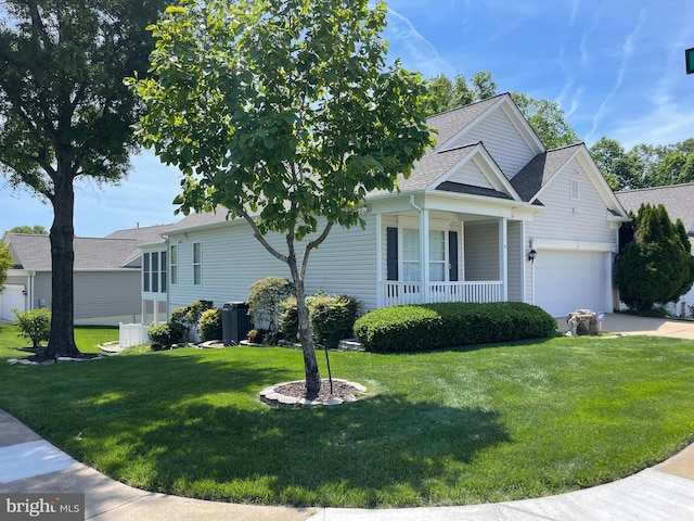 34 Dayton Cir, Fredericksburg, VA 22406 - view of front of house featuring a front lawn, covered porch, a garage, roof with shingles, and driveway