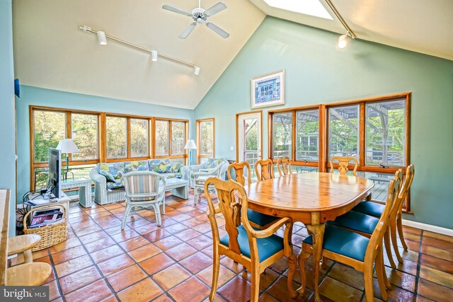 22 Harbor Rd, Rehoboth Beach, DE 19971 - dining area featuring rail lighting, high vaulted ceiling, ceiling fan, and baseboards