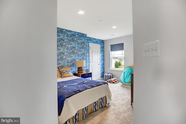 bedroom featuring carpet floors, recessed lighting, baseboards, and wallpapered walls