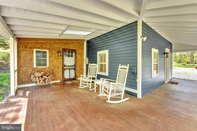 wooden deck featuring a porch