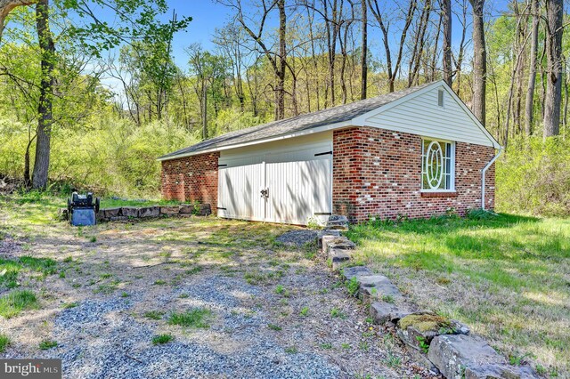 view of outbuilding featuring an outbuilding