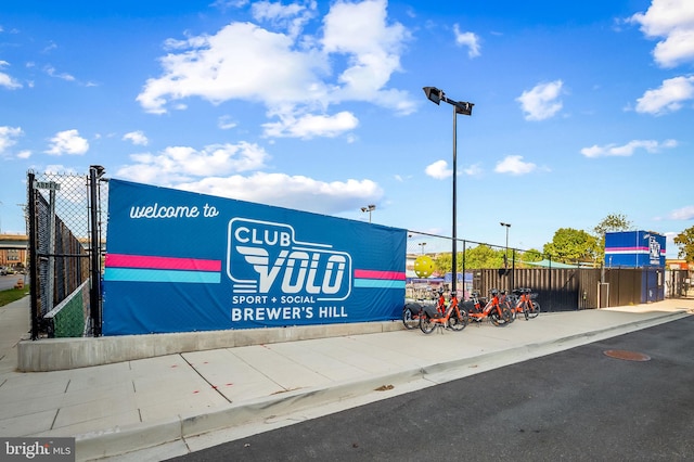 surrounding community featuring fence