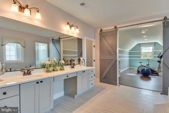 17905 Queen Anne Rd, Upper Marlboro, MD 20774 - bathroom with visible vents, a sink, a healthy amount of sunlight, and double vanity