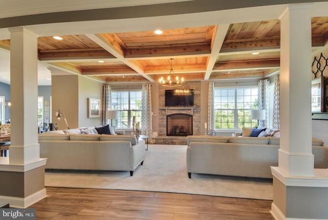 17905 Queen Anne Rd, Upper Marlboro, MD 20774 - living room with a large fireplace, wood finished floors, wooden ceiling, beamed ceiling, and recessed lighting