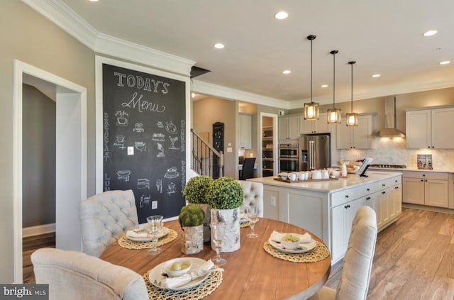 17905 Queen Anne Rd, Upper Marlboro, MD 20774 - dining room with stairway, recessed lighting, ornamental molding, and light wood-type flooring
