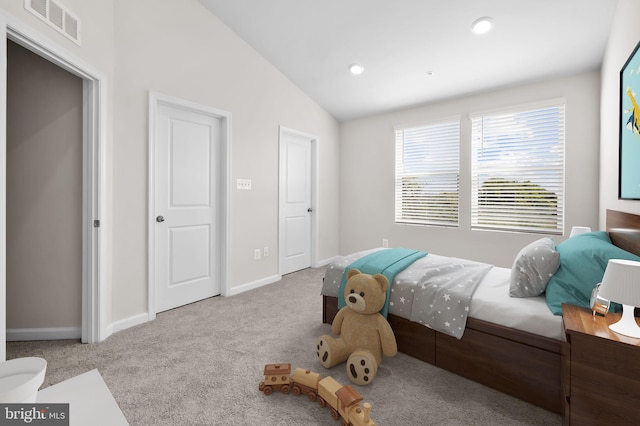 carpeted bedroom featuring recessed lighting, baseboards, visible vents, and lofted ceiling
