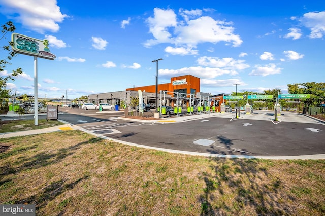 exterior space with street lighting and curbs
