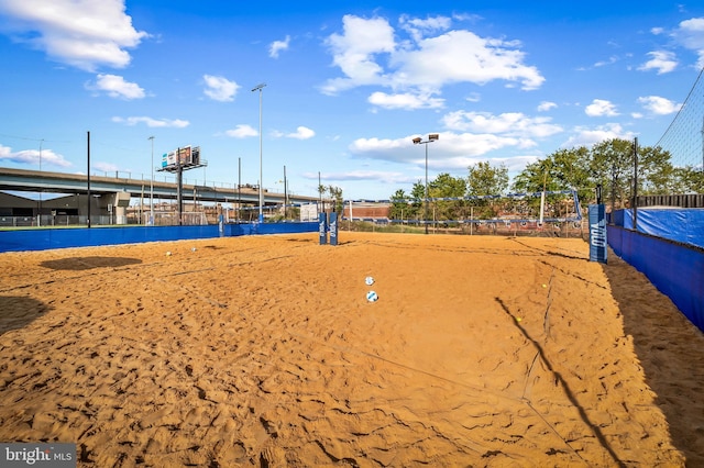 view of property's community featuring volleyball court