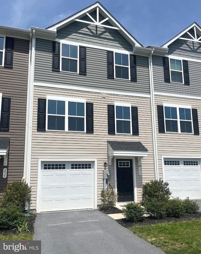 230 Rhea Dr, Martinsburg, WV 25403 - view of property featuring an attached garage and aphalt driveway