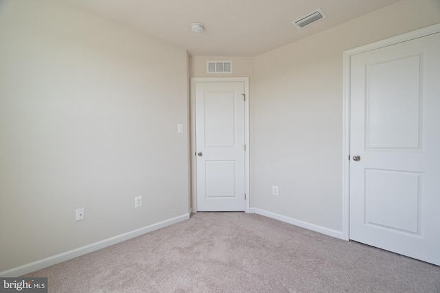 230 Rhea Dr, Martinsburg, WV 25403 - unfurnished bedroom with baseboards, carpet, and visible vents