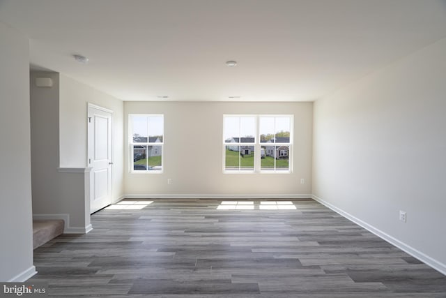 230 Rhea Dr, Martinsburg, WV 25403 - spare room with baseboards, plenty of natural light, and wood finished floors