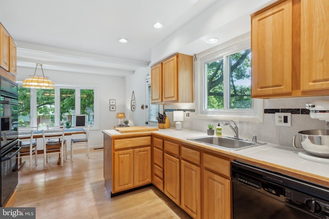 1406 Catlyn Pl, Annapolis, MD 21401 - kitchen featuring black appliances, a sink, healthy amount of natural light, a peninsula, and recessed lighting